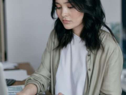 Small business owner checking credit score for a business loan in Canada
