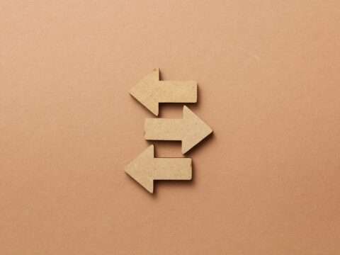 Arrows pointing in different directions representing choosing a business lender in Canada