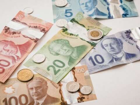 Comparison concept showing private lender and bank business loans in Canada with financial icons and business growth imagery.