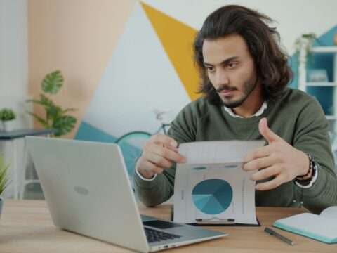 Entrepreneur reviewing financing options for a new small business in 2025.